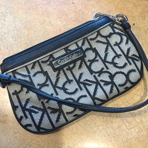 Back and silver Calvin Klein wristlet